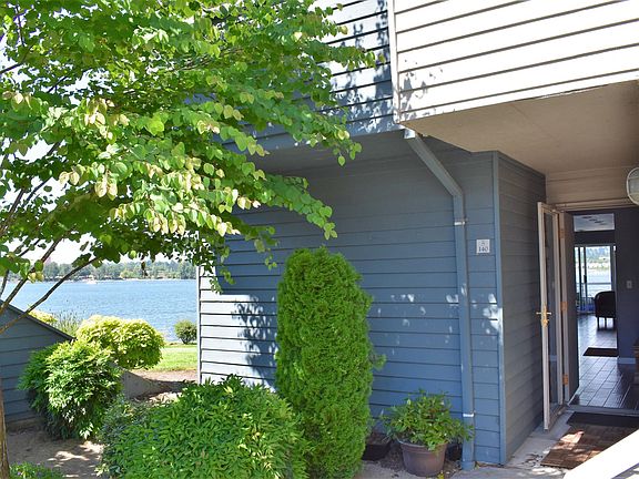 front entry on the ground level, one parking space in front.