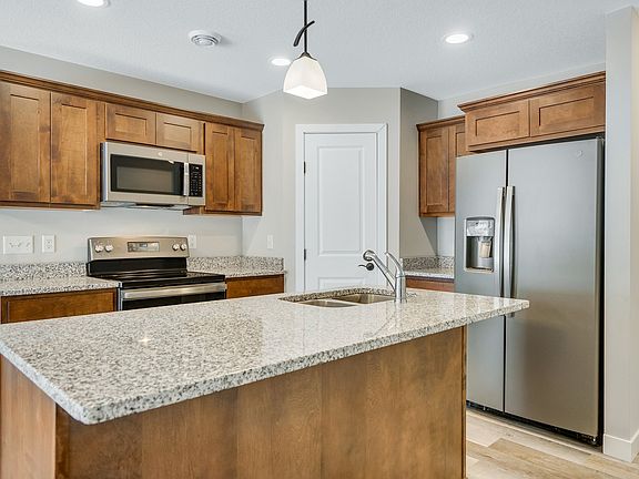 Granite Kitchen Counter Tops As Well As Both Vanities.