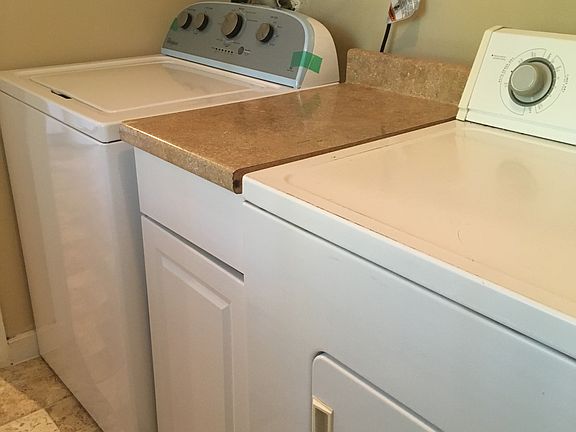 Large Laundry room with storage