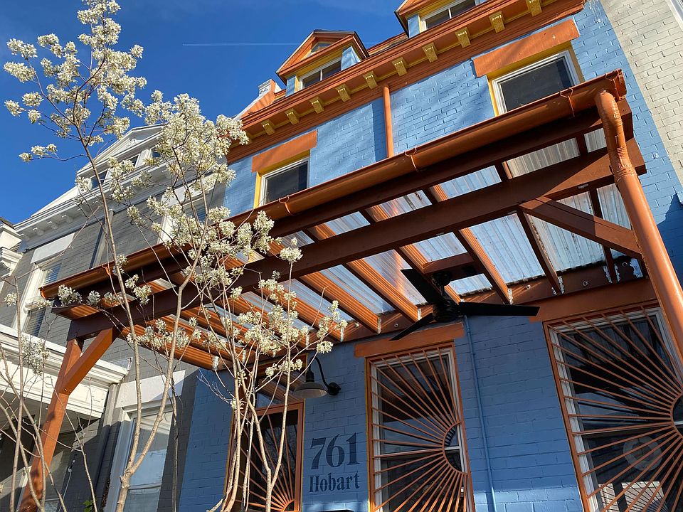 Front of house, with serviceberry in bloom.