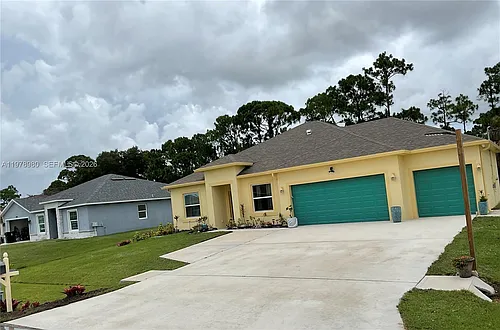 6157 NW Gatun Dr Photo 1