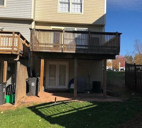 Rear deck with walkout brick patio
