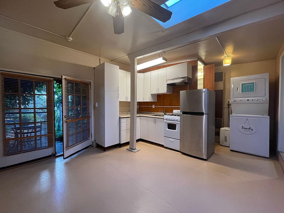 Living area with skylight. Range runs on natural gas which is included in he rent. The gigabit WiFi transmitter located in cabinet to left and is hard-wired to the router with CAT5e. Unlimited, un-throttled WiFi is included in the rent.
