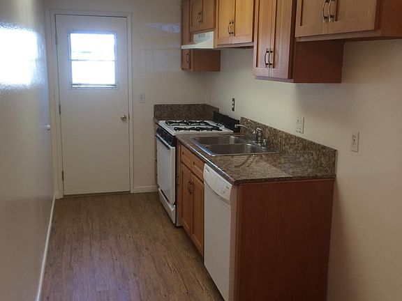 Kitchen with Granite, New Cabinets and Stainless Sink