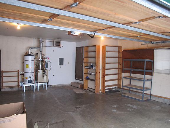 Large 2 car garage with space for work bench.