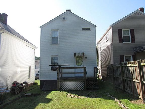 Level back yard with deck 