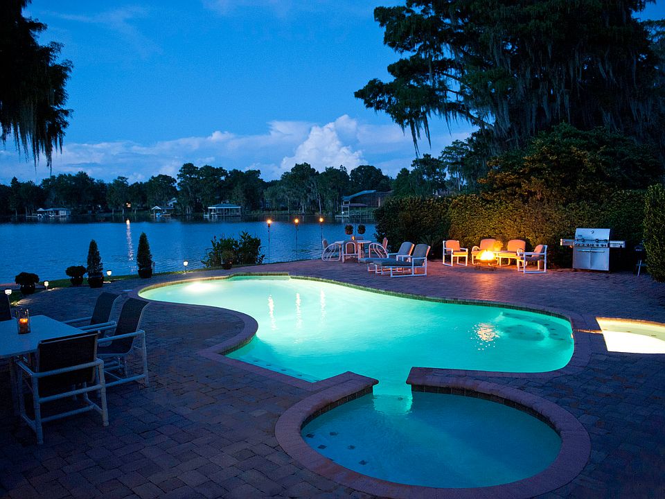 Dusk photo of pool & deck