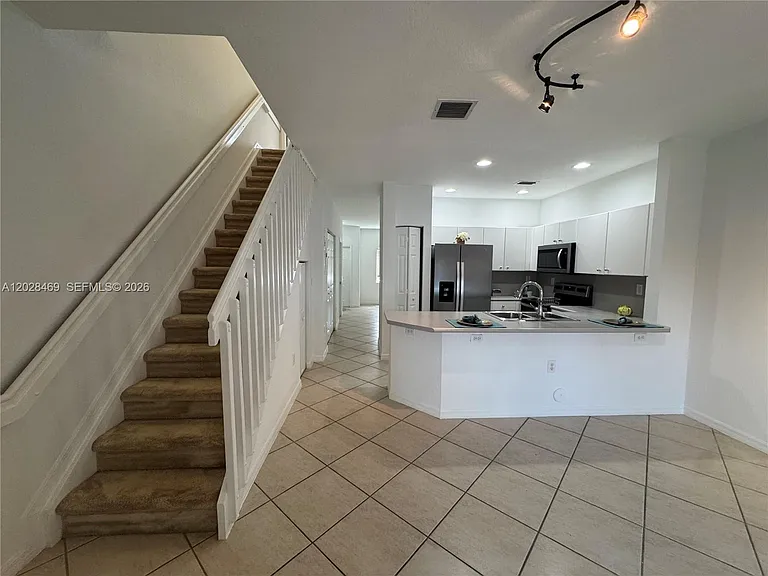 5743 NW 114th Path #106 — Photo 5