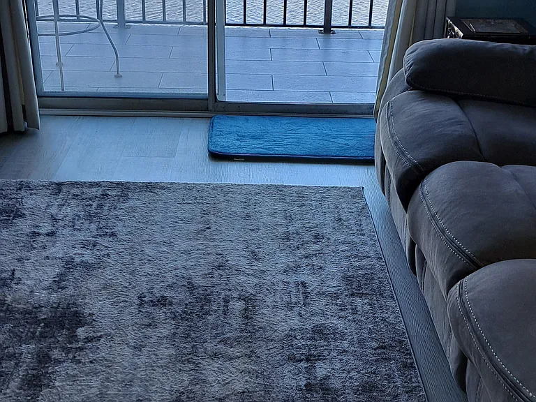 Living room with sliding door from each room overlooking the Inter-coastal waterway.