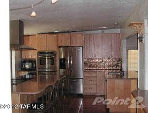 KITCHEN OPEN TO FAMILY AND DINING ROOM