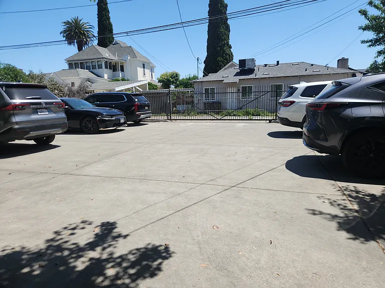 Gated parking with alley access.