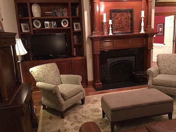 Family room with TV, smart DVD player, custom built in cabin