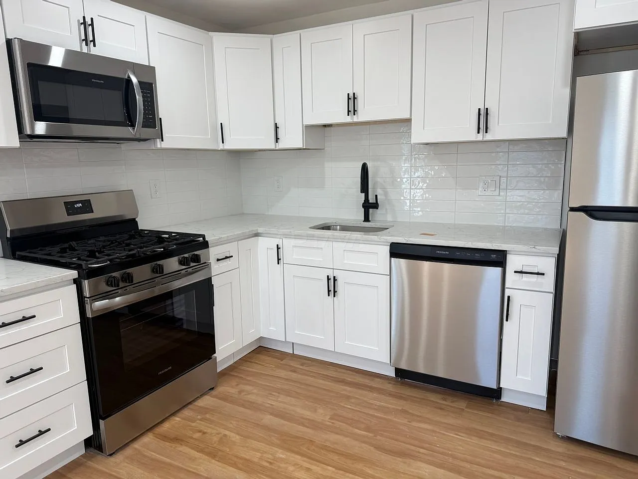 Sunny & Bright Renovated Top-Floor Unit | In-Unit Laundry — Photo 2