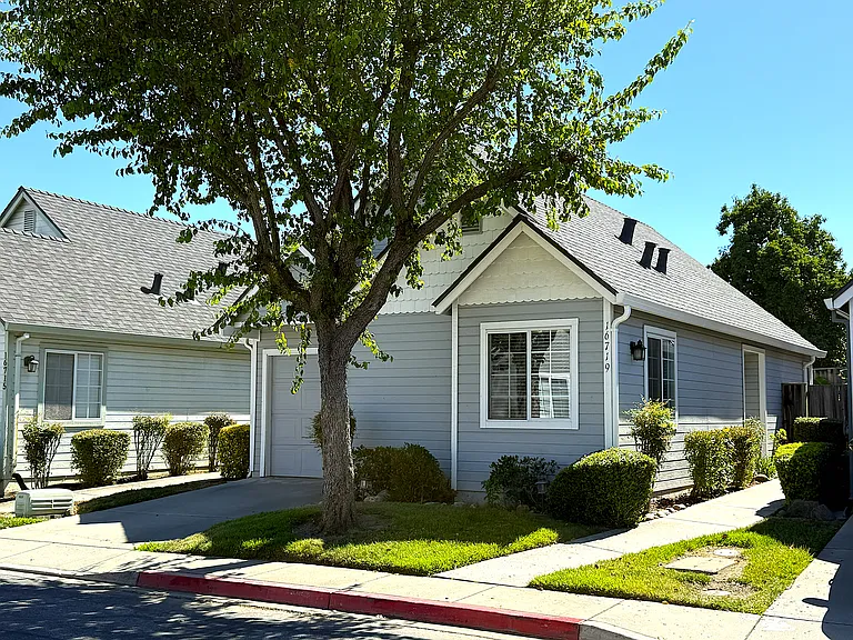 Front with Driveway and Garage