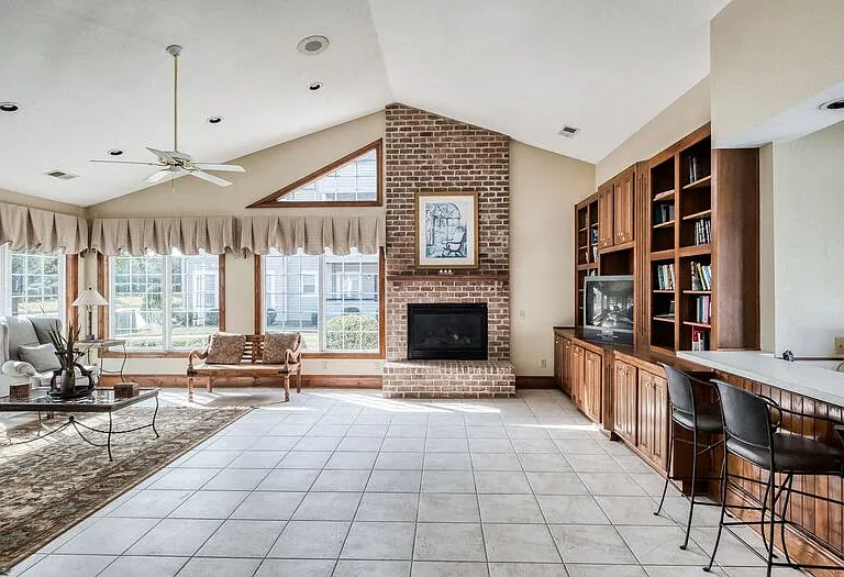 Bright and open clubhouse with fireplace