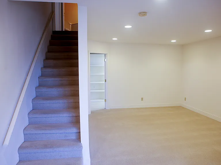 Stairs up to main floor
