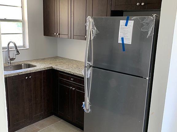 Refrigerator view in kitchen