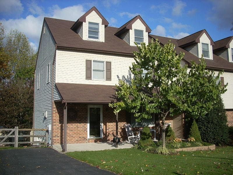 The house on the left of this twin