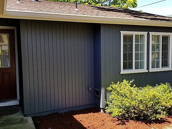 Front door and master bedroom window, June of 2018