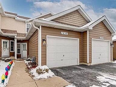 One car garage with two remotes with storage shelves