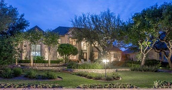 Outdoor lighting and large private yard.