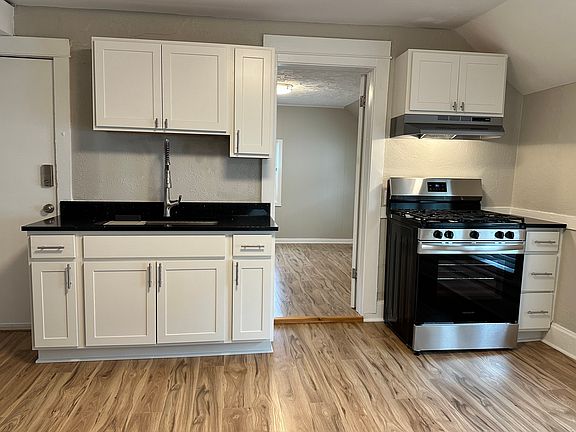 New cabinets and Stainless steel appliances.