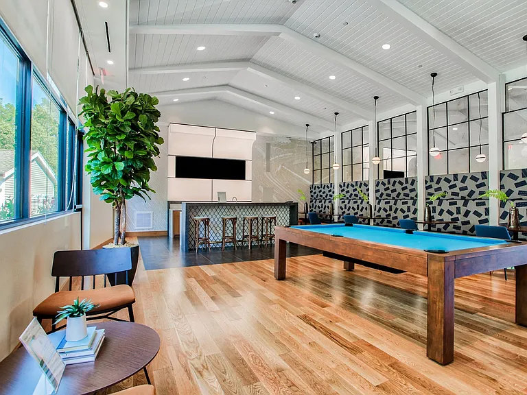 Catch a game on one of the large screen TVs in the spacious entertainment lounge