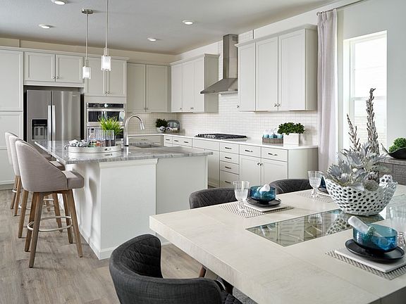 Example of the open-concept floorplan where the kitchen and dining area flow into one another