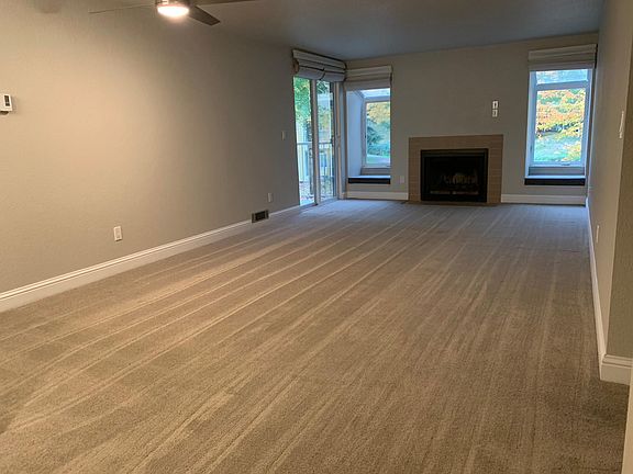 Wood burning fireplace, garden windows, and private patio