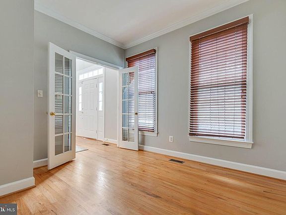 Just off the foyer is an office or library space