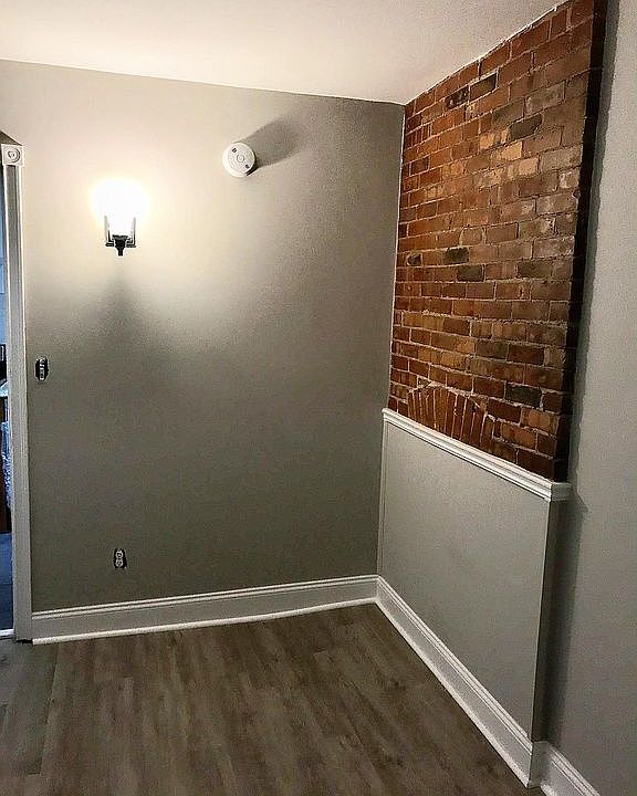Exposed brick in bedroom