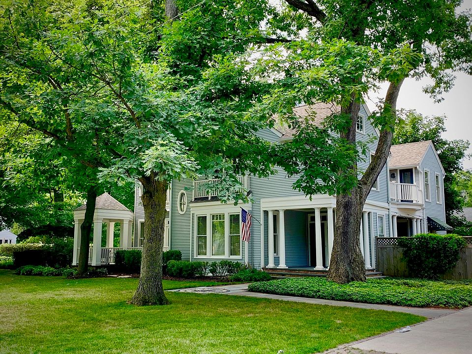 Enjoy lake breezes from one of the covered porches or patio and fireplace!