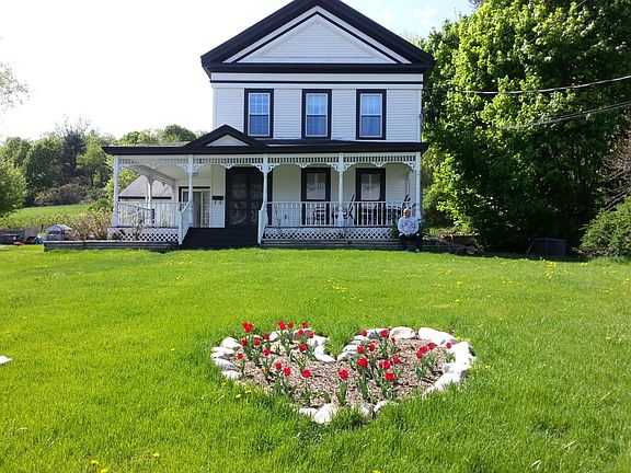 View of Front apartment entrance in Summer.