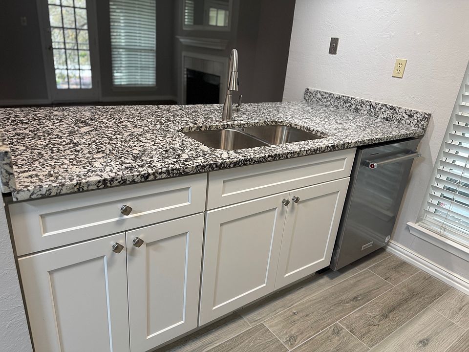Kitchen with granite counter