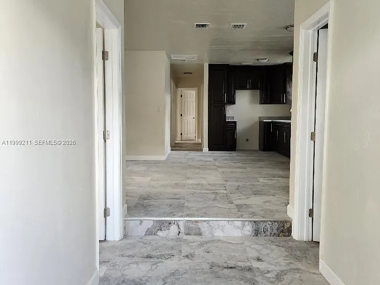 7750 NW 14th Pl — Photo 3