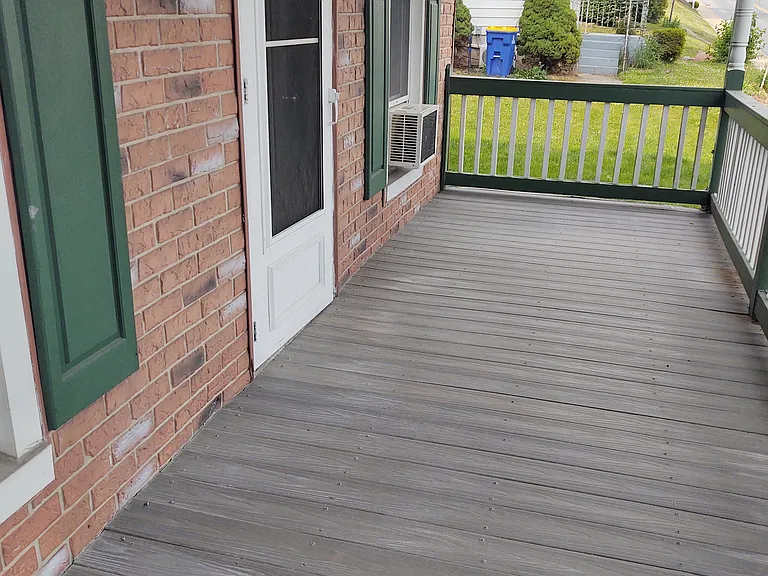 Large front porch perfect for rocking chairs.