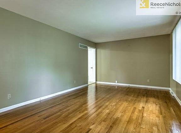 Living room looking toward kitchen entry