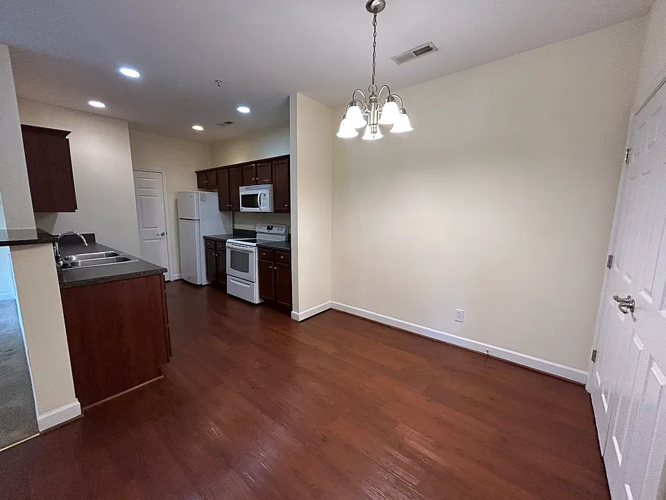 Dining Area. Washer/Dryer located in close to the right 

(3 BR, 2 BA Layout)