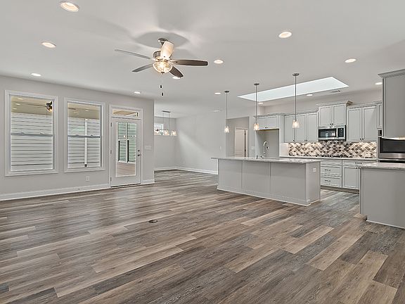 The Newbury Great Room to Kitchen