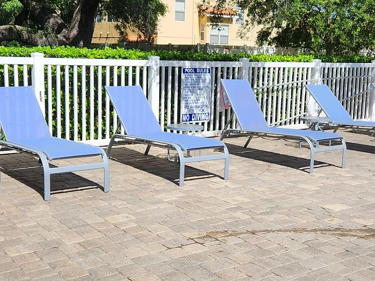 plenty of places to sit and enjoy pool and outdoor living