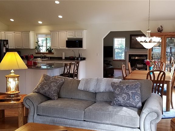 Bright and cheery the open concept living room, dining room and kitchen make for the perfect entertaining home.