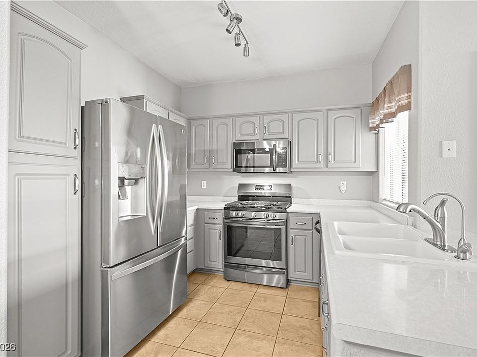 1st image of 855 N Stephanie St Unit 1115