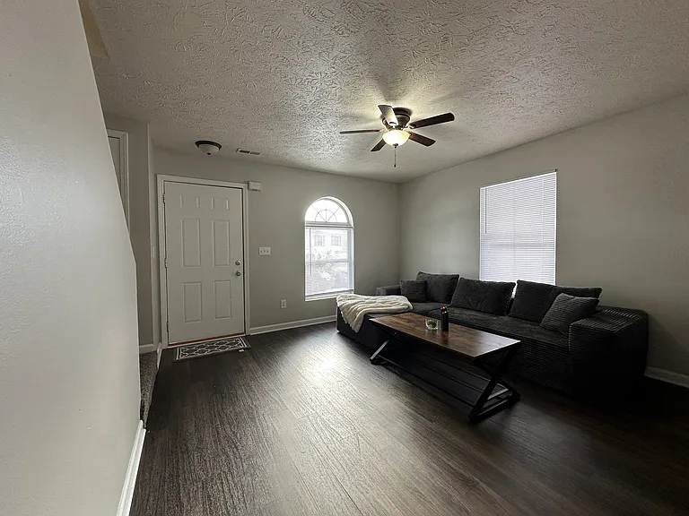 (3 Bed 1.5 Bath Unit )Living room - Freshly painted and updated Plank flooring