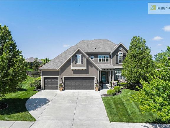 The absolutely gorgeous yard has been maintained with the utmost of care.  It's stunning from every angle!  Established trees, sprinkler system and fence add to the outdoor appeal as does the 2019 exterior paint job.