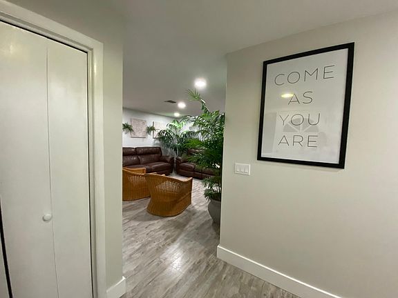 Entryway closet and view into living space