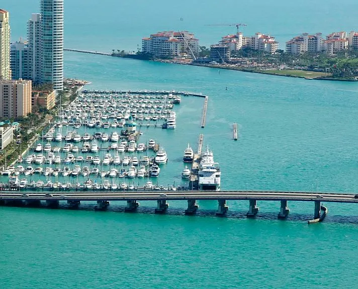 marina with boat slips around the corner