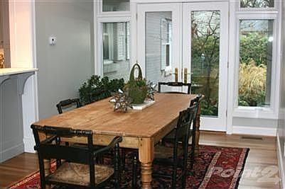 The breakfast room is open to the kitchen. It would also make a great den or sunroom