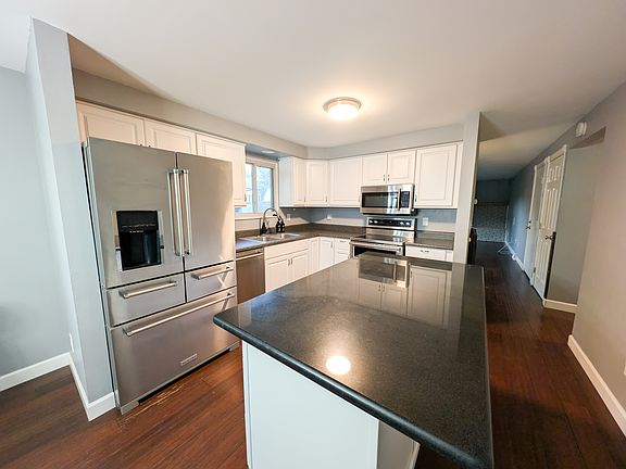 View of kitchen from dining