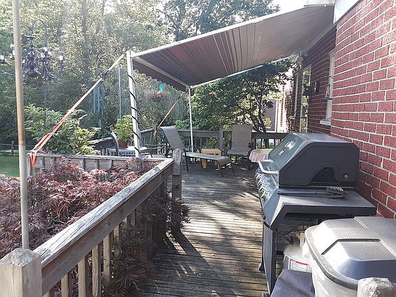 Back deck with awning. 