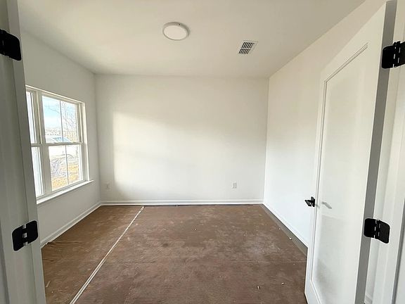 Study featuring AW Collection R Oxford - A quiet retreat with depth and warmth.